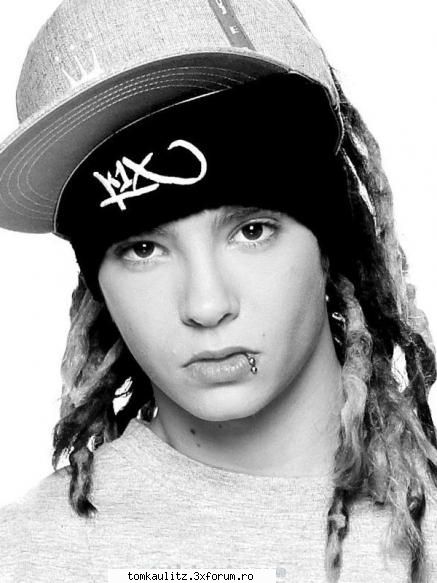 ce imi place la tom si cum e?!!pai  tom este foarte concetrat la ce face  si la ce se gandeste in