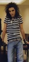 rapp-er sau rock-er - cu toate k el canta ontr-o trupa de ROCK lui ToM - Ce ne place la Tom???