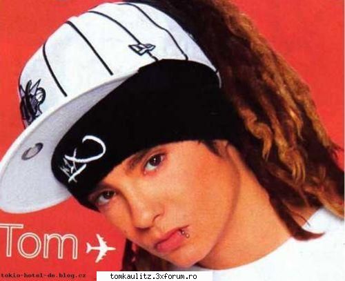 rapp-er sau rock-er - deci ii place rapp-ul... dar canta rock... yo - Ce ne place la Tom???